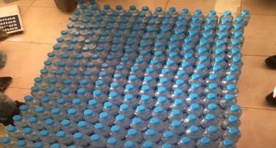 بالصور.. الإطاحة بعمالة وافدة تصنع الخمور وتروّجها في الخفجي