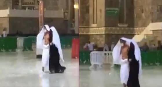 شاهد مافعله زوج لزوجته أثناء هطول الأمطار على الحرم المكي