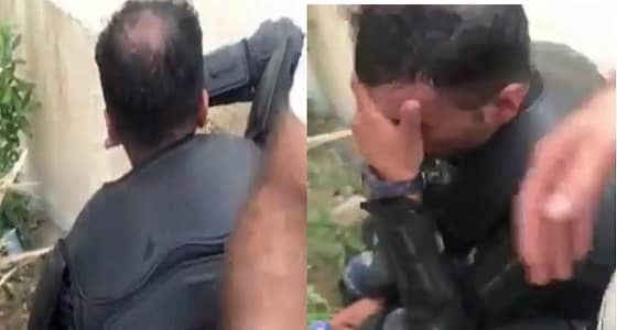 بالفيديو.. شرطي عراقي ينهار باكيا من هول ما رآه بين المتظاهرين